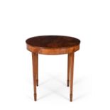 A satinwood and crossbanded circular centre table