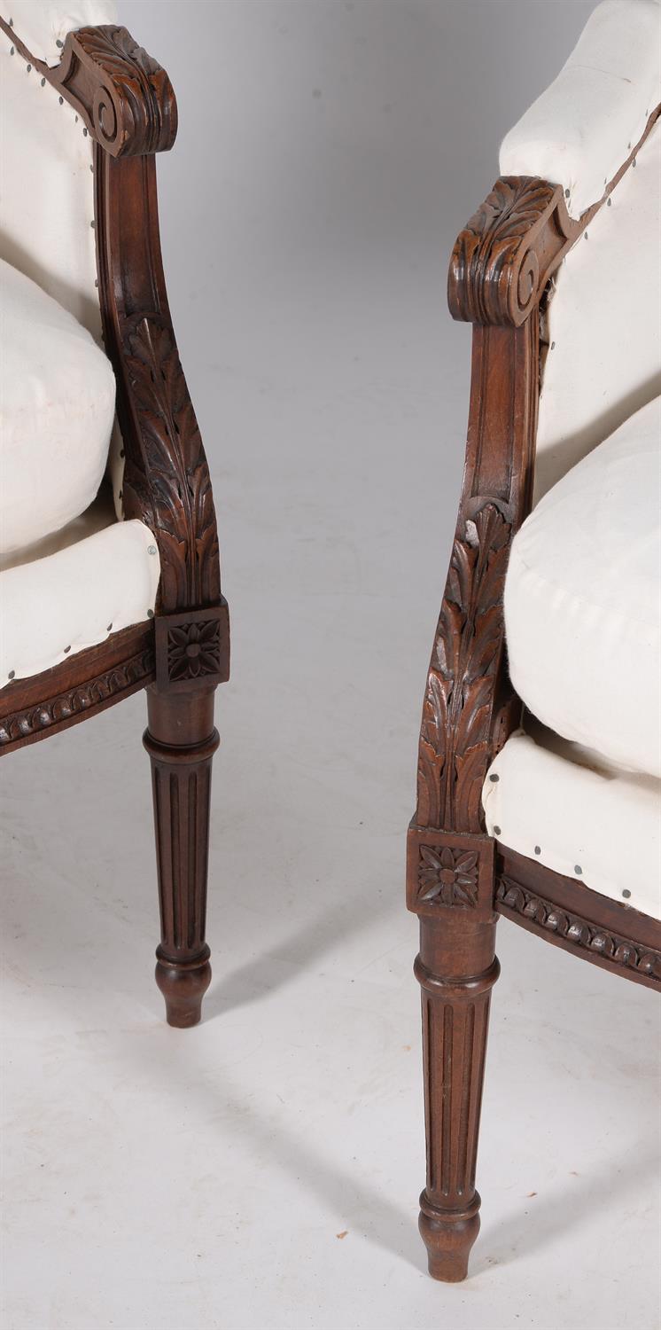 A pair of French carved mahogany armchairs in Louis XVI style - Image 2 of 3