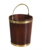 A George III mahogany and brass bound peat bucket