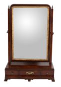 A George III mahogany and parcel gilt dressing mirror