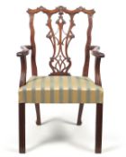 A George III mahogany open armchair
