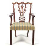 A George III mahogany open armchair