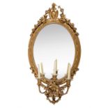 A Victorian gilt wood girandole wall mirror