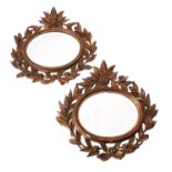 A pair of small giltwood and composition wall mirrors