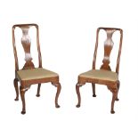 A pair of early Georgian walnut side chairs