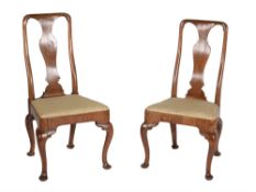 A pair of early Georgian walnut side chairs