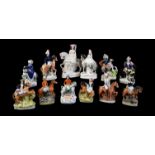 Twelve various Staffordshire pottery equestrian figures