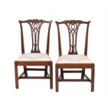 A pair of George III mahogany side chairs