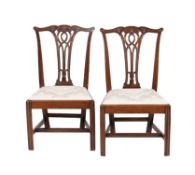 A pair of George III mahogany side chairs