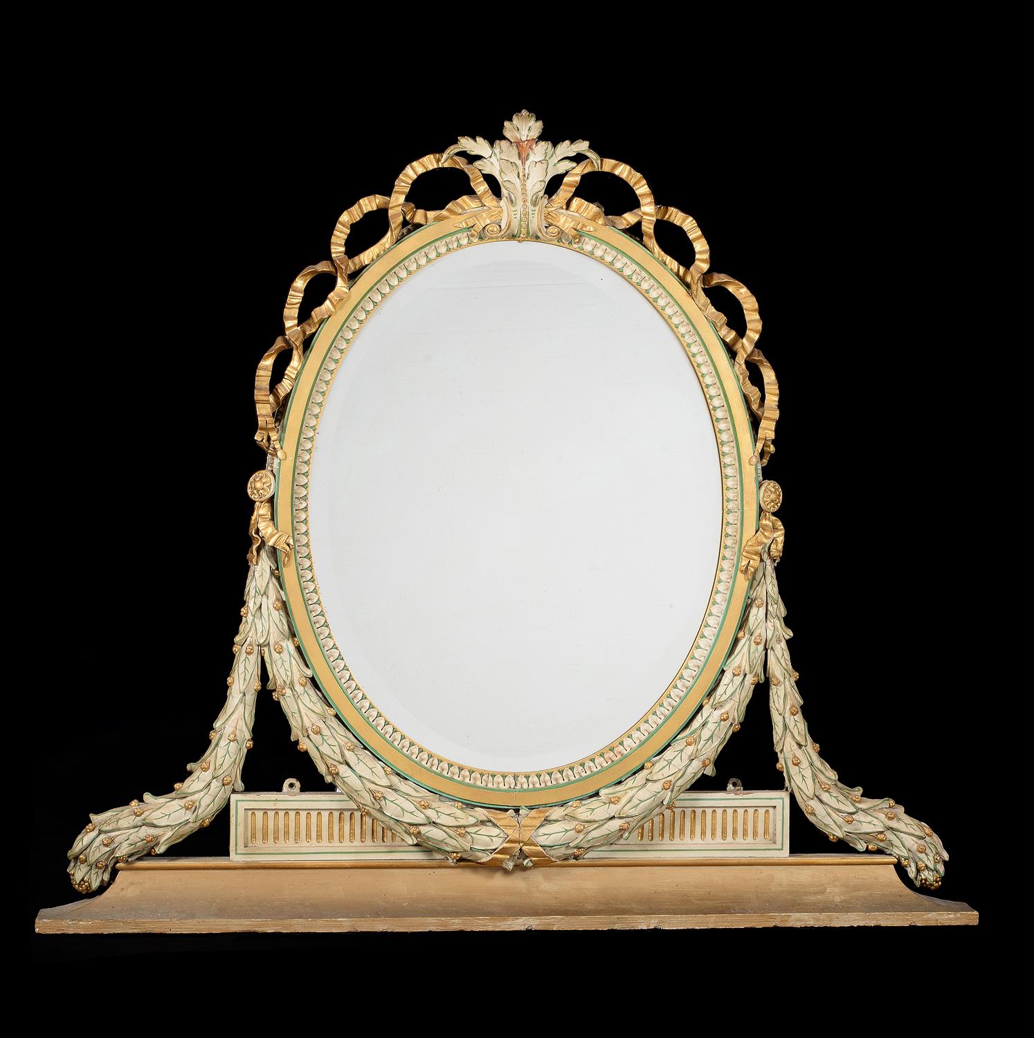 A pair of parcel gilt, green and cream painted composition mirrors, in George III style