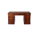 A mahogany pedestal desk