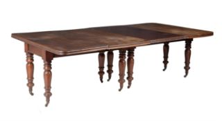 A Victorian mahogany extending dining table