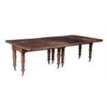 A Victorian mahogany extending dining table