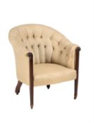 A mahogany button back tub chair in Regency style