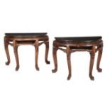 A pair of Chinese hardwood, probably elm, side tables