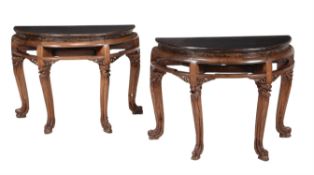 A pair of Chinese hardwood, probably elm, side tables