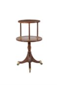 A Regency mahogany and gilt brass mounted two tier dumb waiter