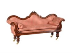 A Victorian mahogany and upholstered sofa