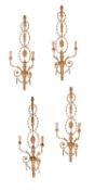 Two pairs of giltwood and composition wall appliques
