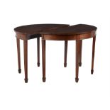 A pair of mahogany side tables in George III style