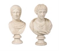 A pair of painted plaster busts of maidens after the Antique