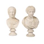 A pair of painted plaster busts of maidens after the Antique