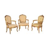 A pair of giltwood and upholstered armchairs in Louis XV style