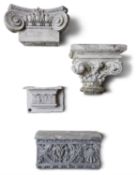 A LARGE COLLECTION OF PLASTER CAPITALS AND PANELS