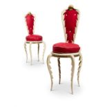 A PAIR OF PAINTED METAL SURREALIST SIDE CHAIRS, BY SERGE ROCHE