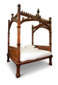 A VICTORIAN GOTHIC REVIVAL FOUR POSTER BED, CIRCA 1860