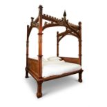 A VICTORIAN GOTHIC REVIVAL FOUR POSTER BED, CIRCA 1860