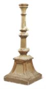 A CONTINENTAL GOLD AND GREY PAINTED PLASTER CANDLE STAND OR ALTARSTICK