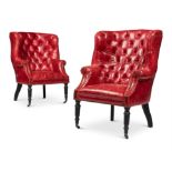 A PAIR OF LEATHER BUTTON UPHOLSTERED WING ARMCHAIRS