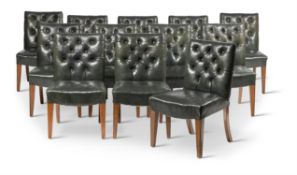 A SET OF TWELVE GREEN LEATHER UPHOLSTERED DINING CHAIRS