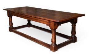 A STAINED OAK REFECTORY TABLE IN EARLY 18TH CENTURY STYLE