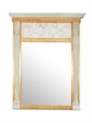 A MONUMENTAL GILTWOOD AND PLASTER MOUNTED WALL MIRROR