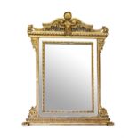 AN ITALIAN CARVED GILTWOOD AND COMPOSITION OVERMANTEL WALL MIRROR