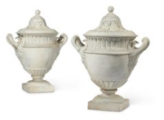 A PAIR OF PLASTER URNS IN GEORGE III STYLE