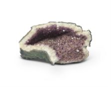 AN AMETHYST AND QUARTZ PART GEODE