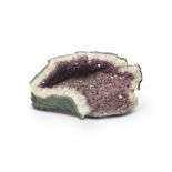 AN AMETHYST AND QUARTZ PART GEODE