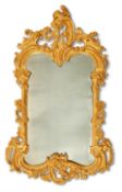 A GILTWOOD WALL MIRROR IN BAROQUE TASTE, CIRCA 1900