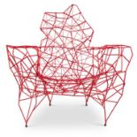 A RED 'PYLON' CHAIR, MANNER OF TOM DIXON