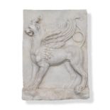 A PLASTER PANEL OF A WINGED LION