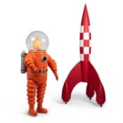 A LARGE MODEL OF TINTIN IN A SPACESUIT TOGETHER WITH A MODEL ROCKET