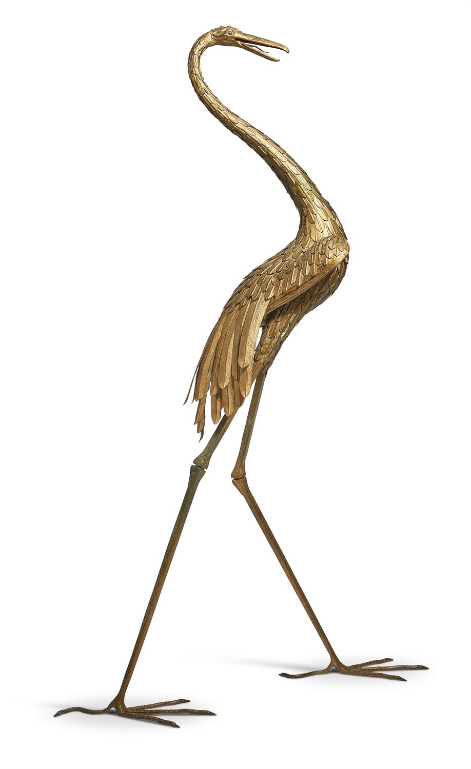 A GILT METAL MODEL OF A STANDING CRANE, LATE 20TH CENTURY