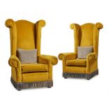 A PAIR OF YELLOW UPHOLSTERED 'CASTLE CHAIRS', BY A MODERN GRAND TOUR