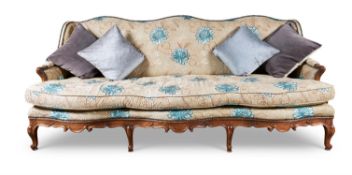 A FRENCH WALNUT SOFA