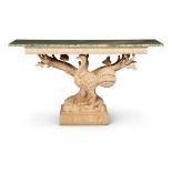 A CONTINENTAL CARVED LIMED OAK AND MARBLE TOPPED PIER TABLE