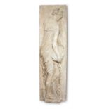 AN OVER-LIFE SIZE PLASTER RELIEF OF A NYMPH