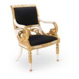 A FRENCH EMPIRE STYLE PAINTED AND PARCEL-GILT SALON CHAIR